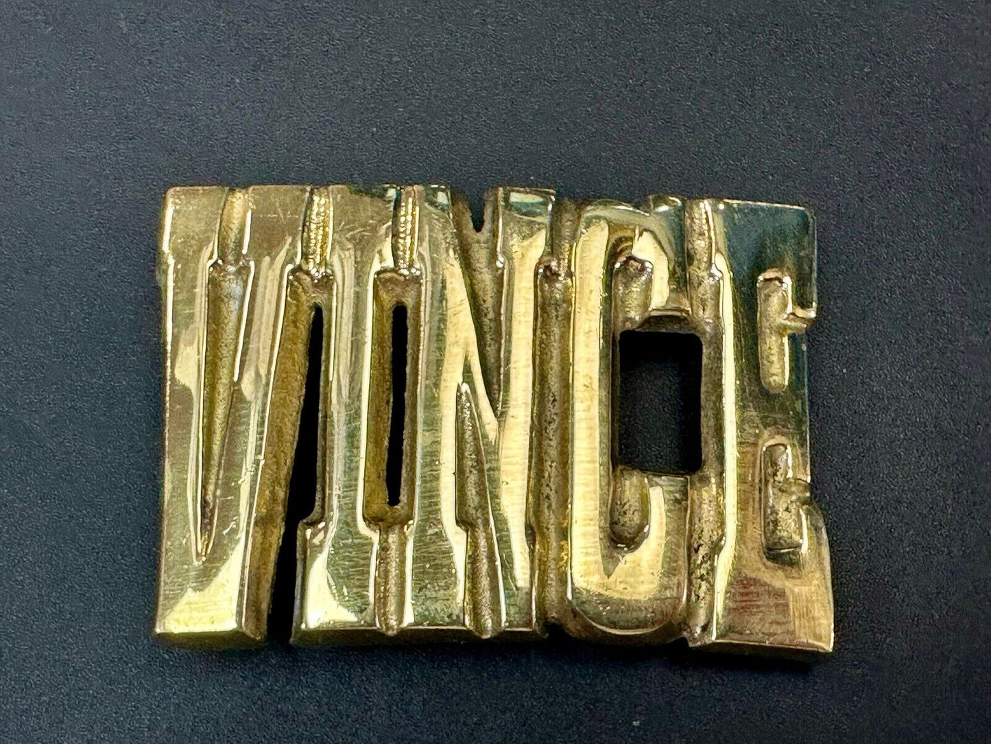 Vince,  Cutout block letters solid brass Vintage belt buckle marked Taiwan ROC