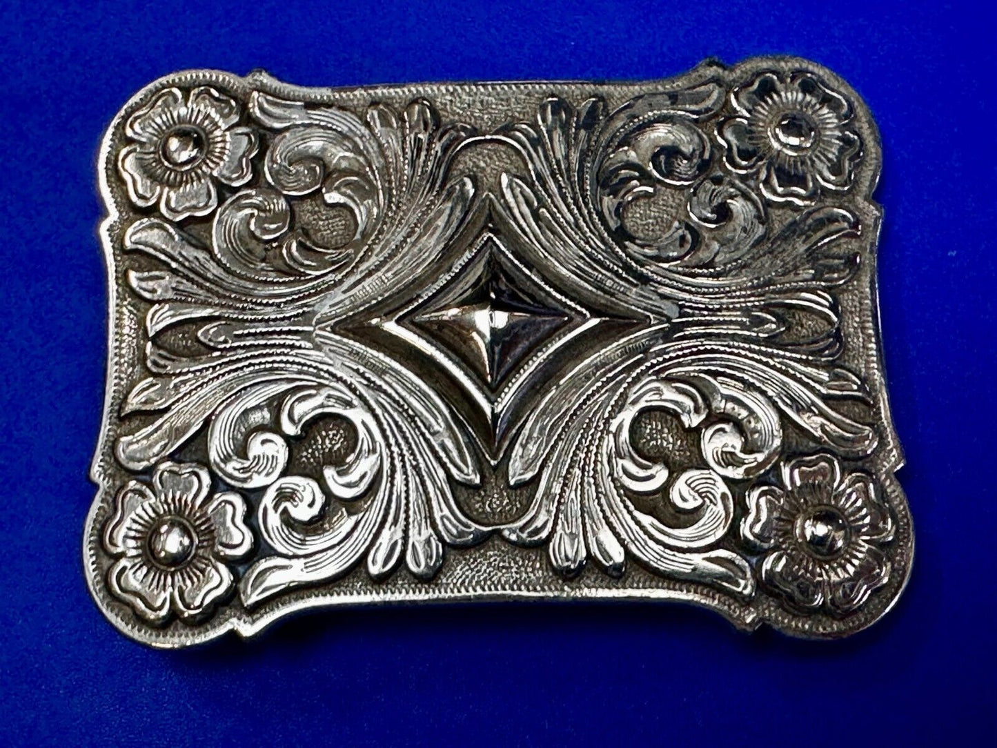 Vintage Ivan Brand Raised Diamond Center Flower Swirl Design Belt Buckle