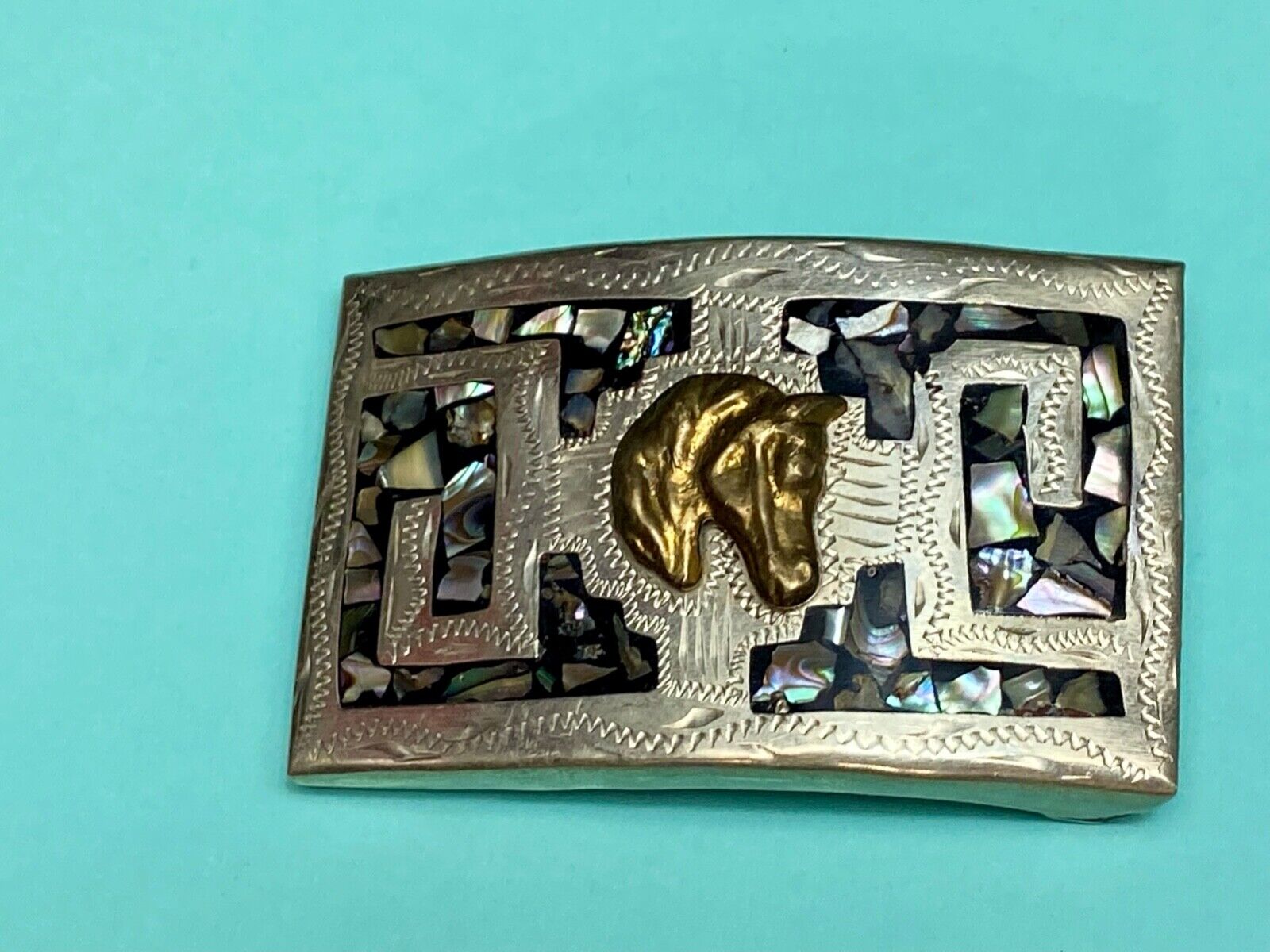 Vintage horse head on abalone shell inlay artist stamped western belt buckle