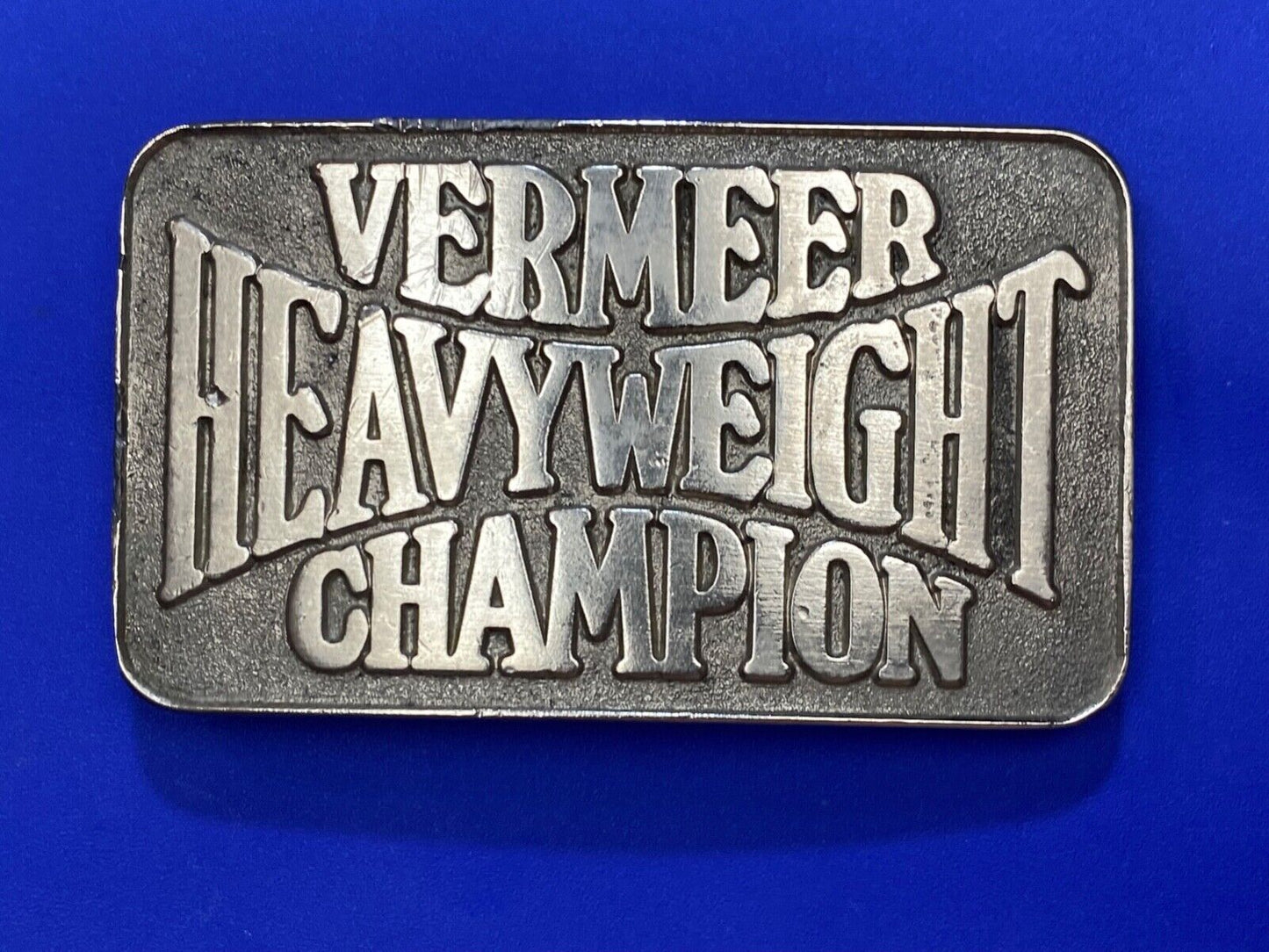 Vermeer Heavyweight Champion Belt Buckle by Spec Cast