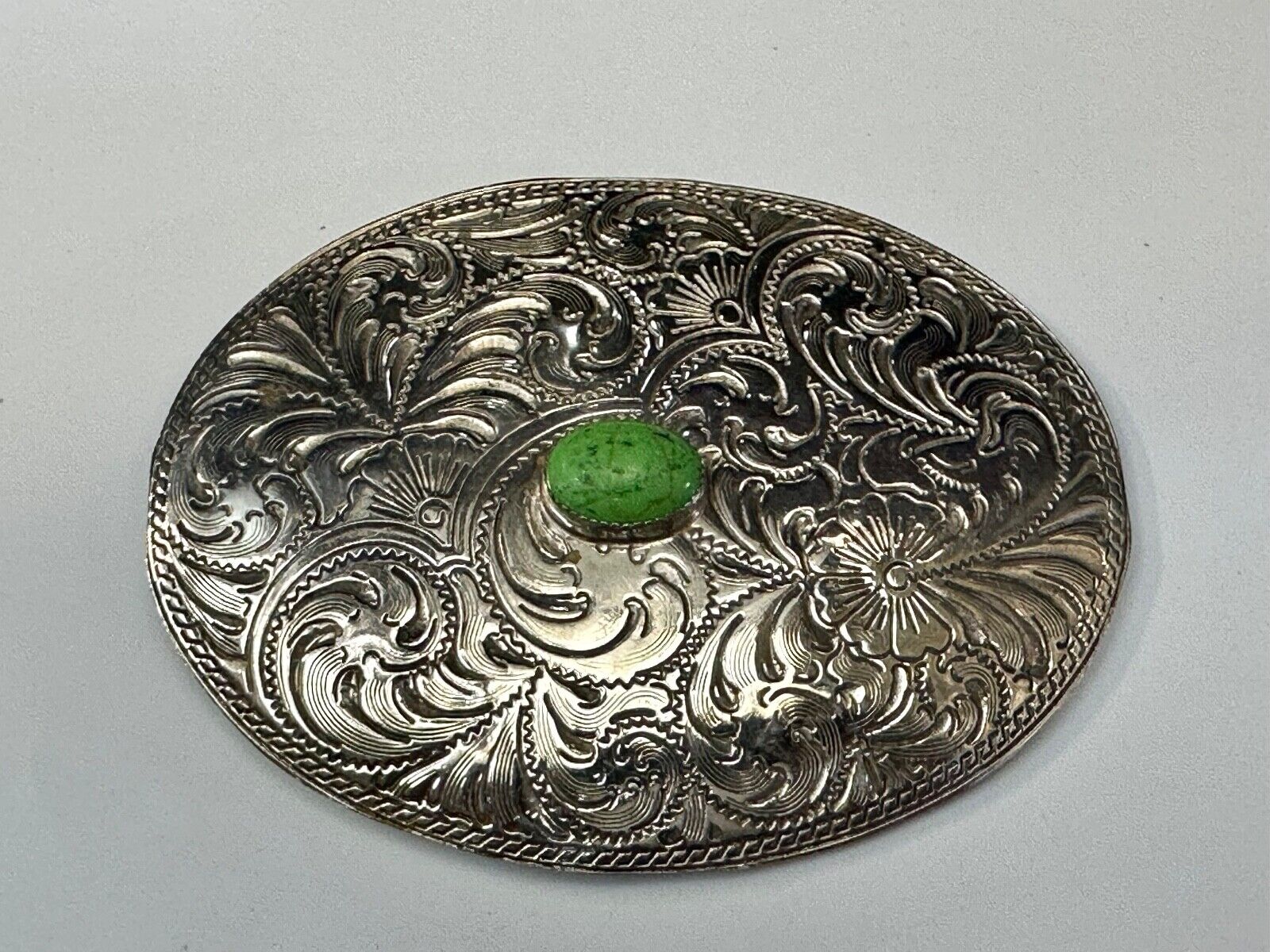Artisan Made vtg Large western flower swirl design belt buckle  green center Cab