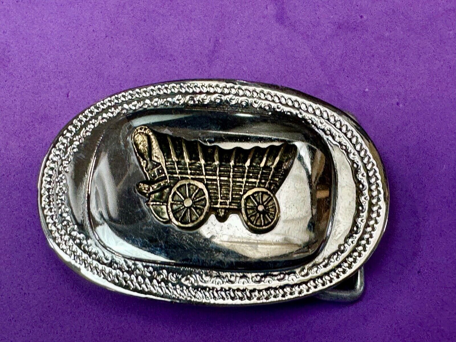 70s Covered Wagon two tone reflective oval ornate boarder belt buckle
