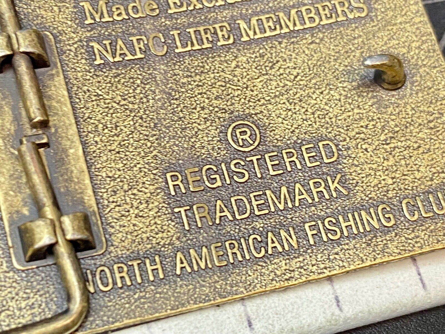 Vintage Life Member of the North American Fishing Club brass tone belt buckle 