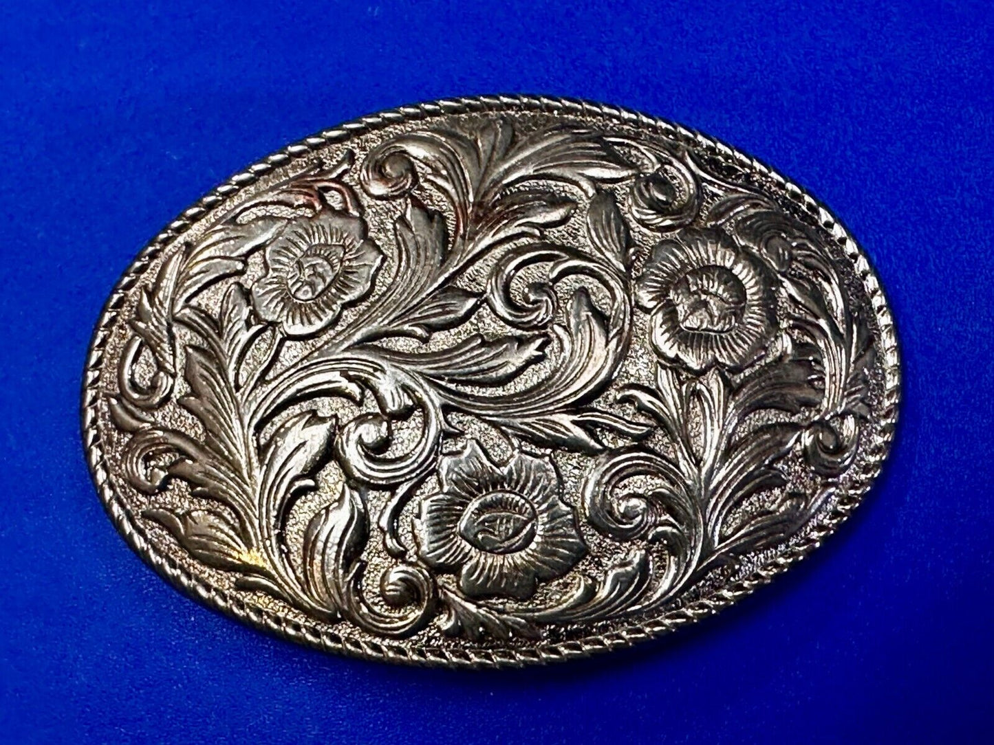 Vintage gold tone western flower swirl floral design belt buckle