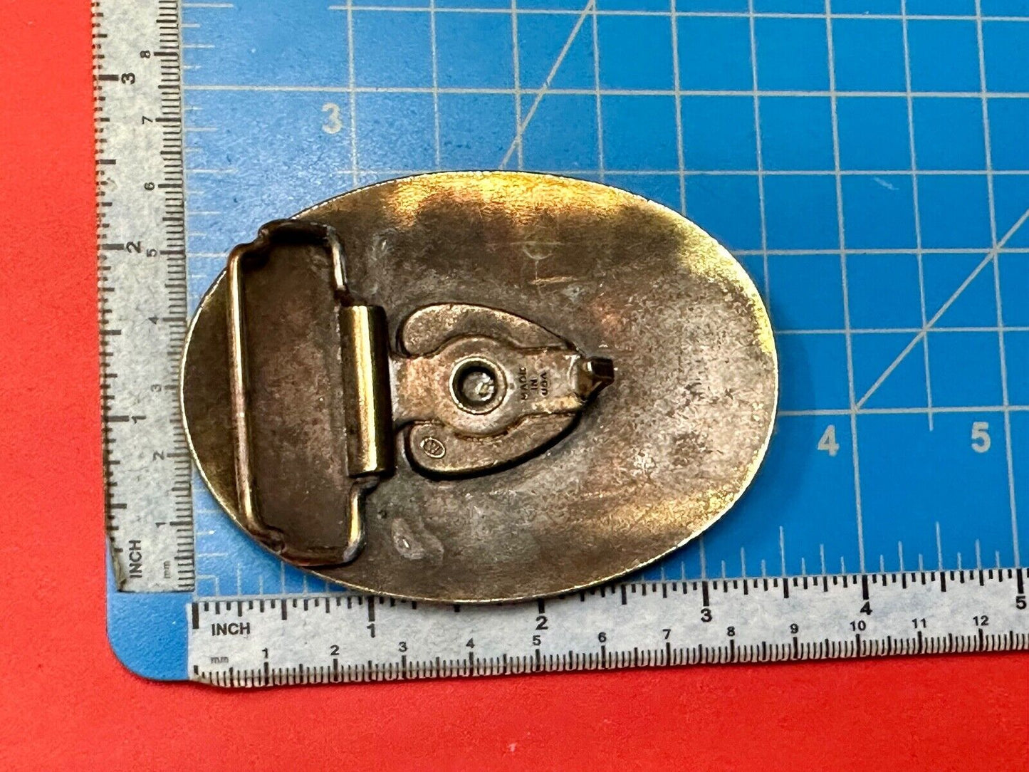 USA made vintage western flower swirl design oval belt buckle marked W