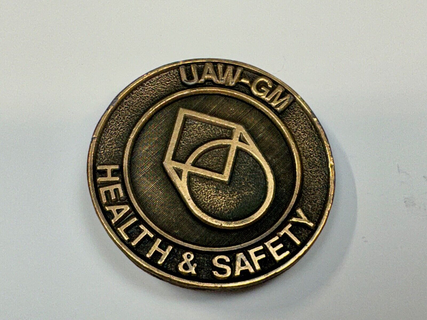 UAW-GM auto workers union round Health & Safety Award belt buckle