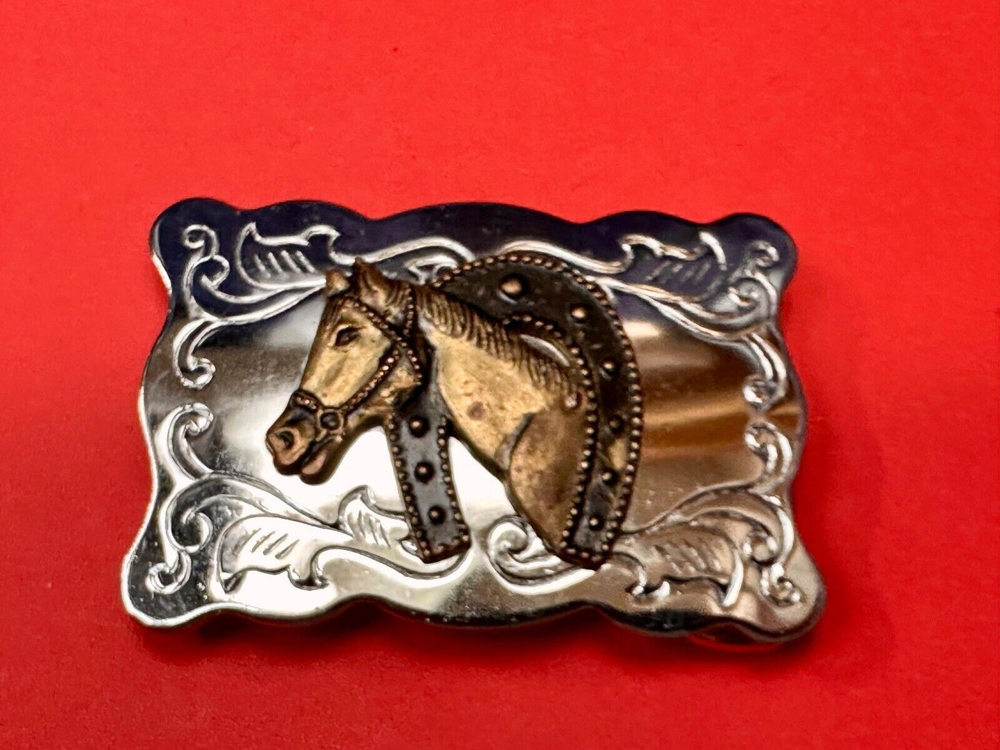 Vintage lucky horseshoe with head centerpiece on western two tone belt buckle