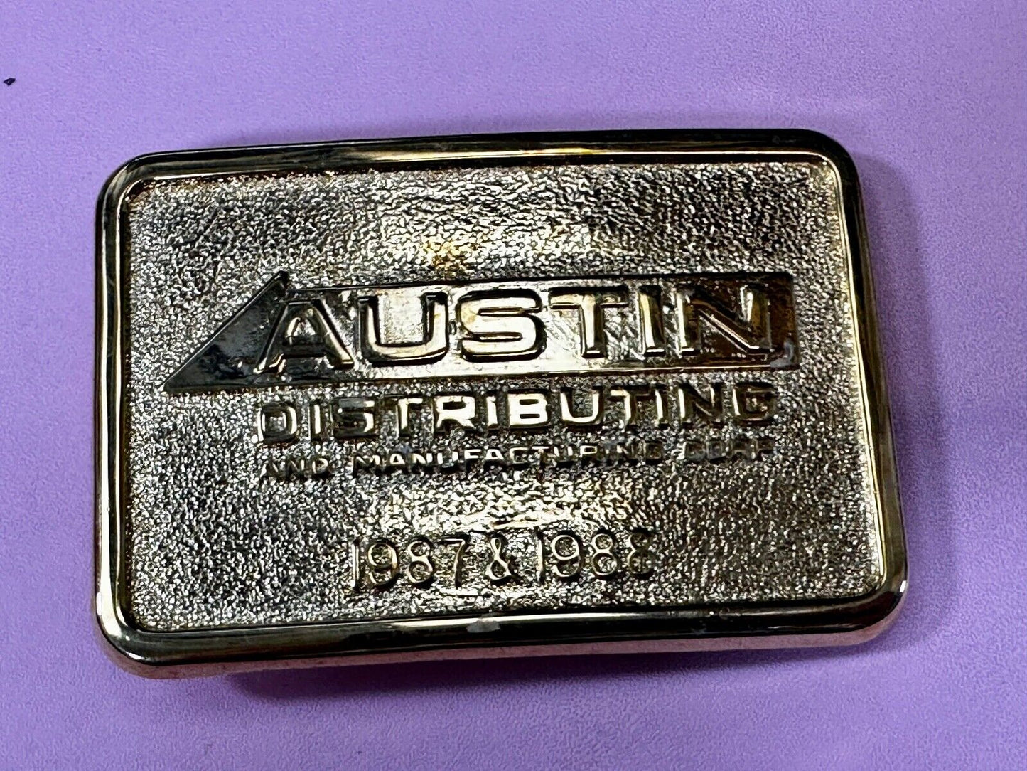 Austin Texas Distributing and Manufacturing 1987 Gold Tone Belt Buckle