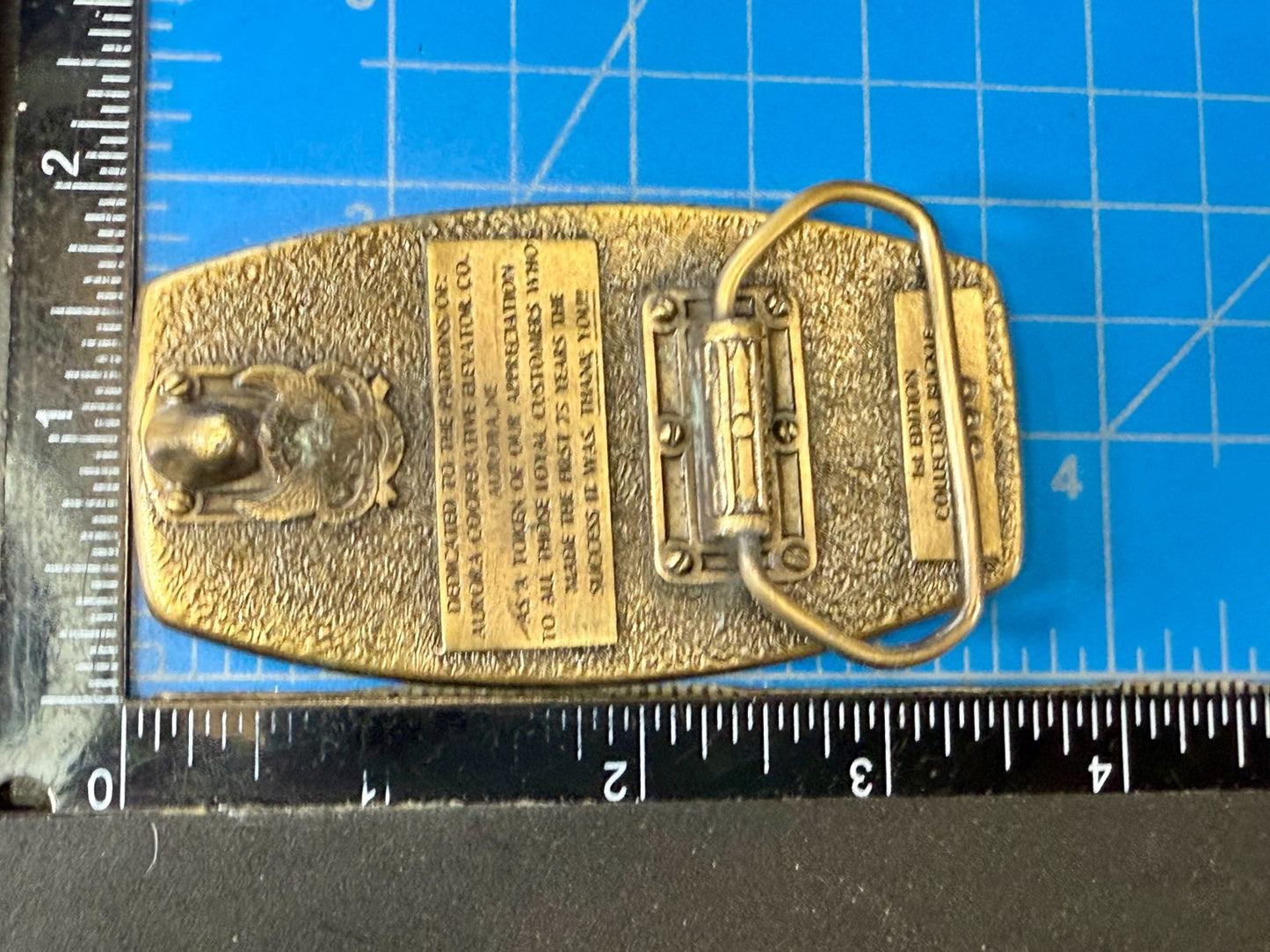 Aurora Co-Op Elevator Company at your Service 75th Anniversary Belt Buckle