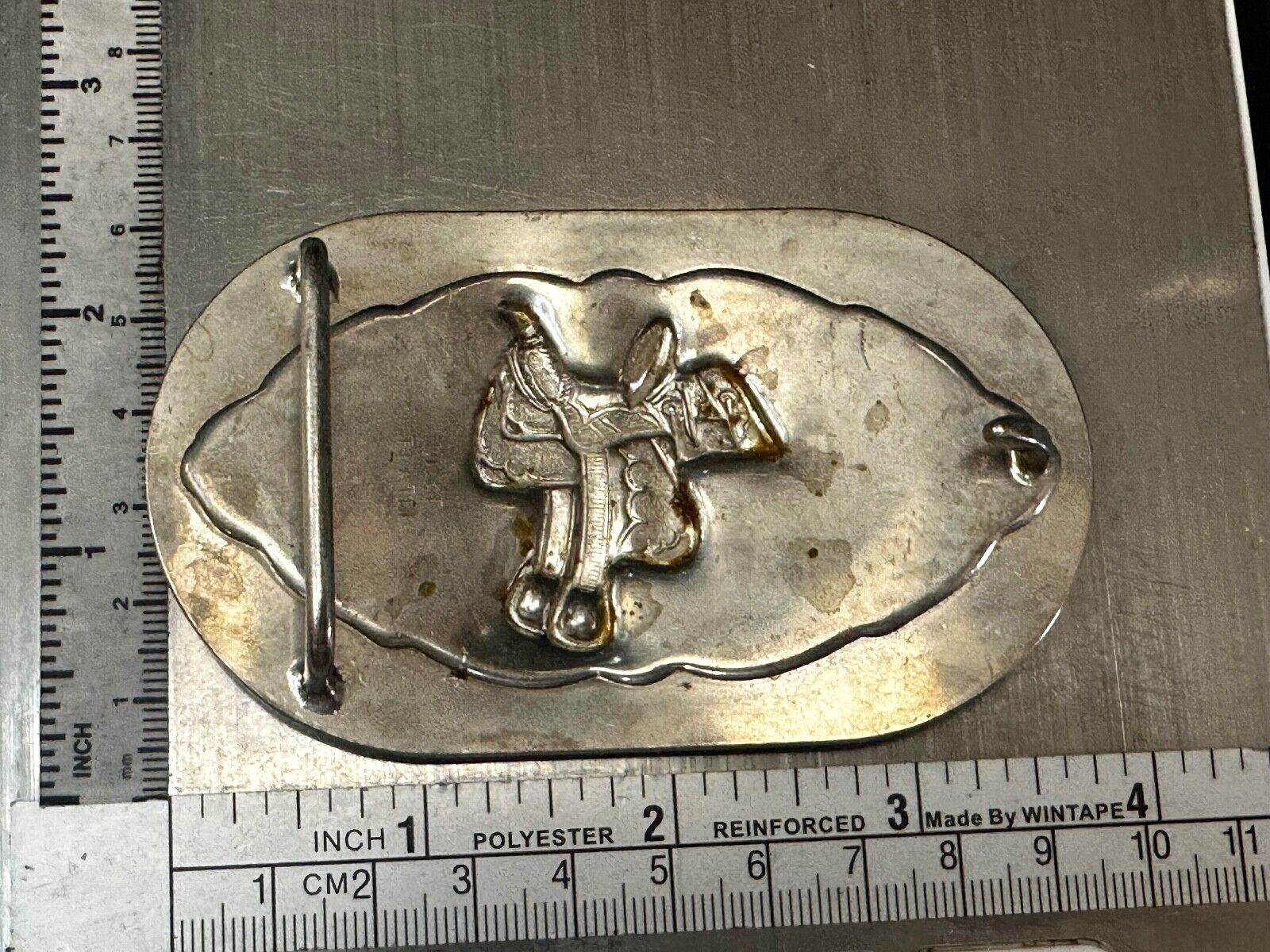 Vintage horse saddle used Belt Buckle to restore
