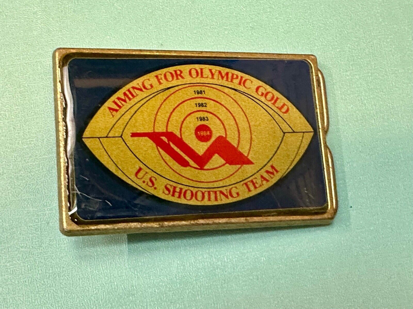 Aiming for Olympic gold - Los Angeles 1984 US shooting Team belt buckle