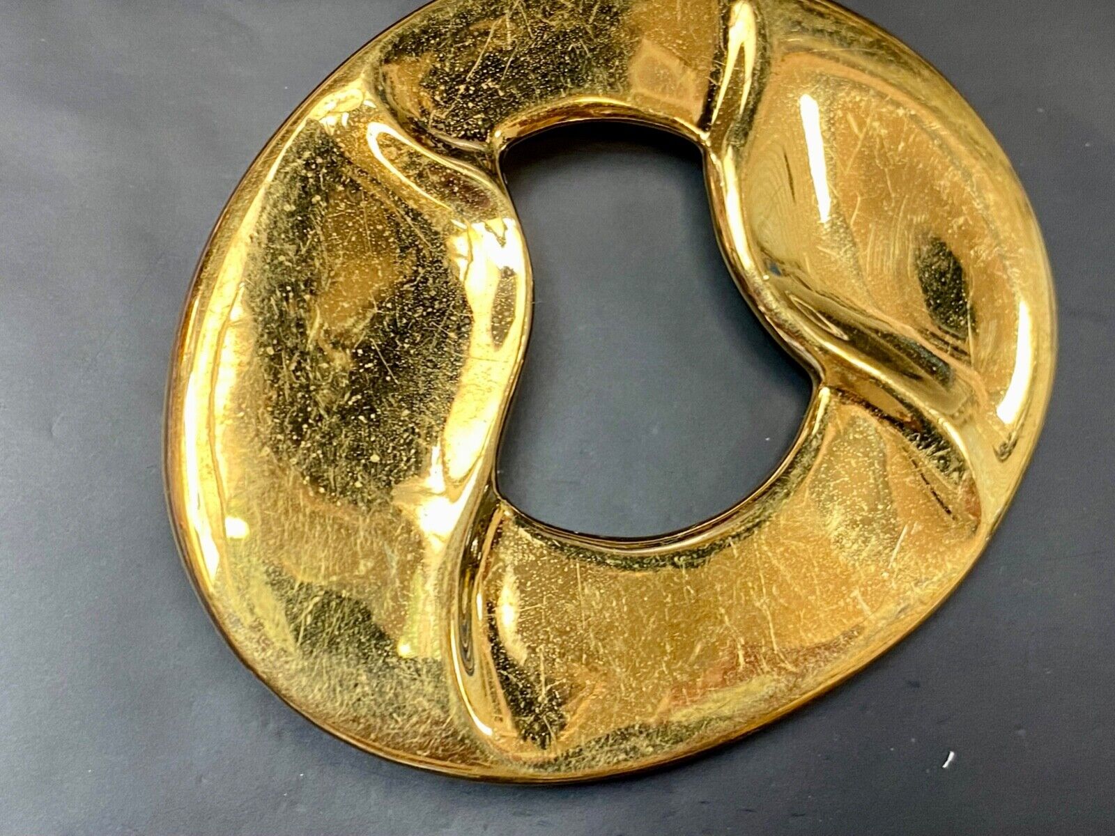 Artist Ginnie Johansen signed gold color abstract oval belt scarf slide