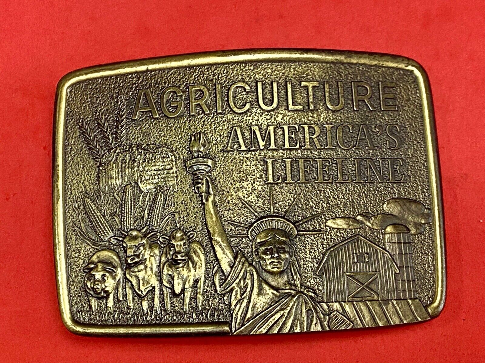 AGRICULTURE, Americas Lifeline belt buckle by Farmhand - Statue of liberty 