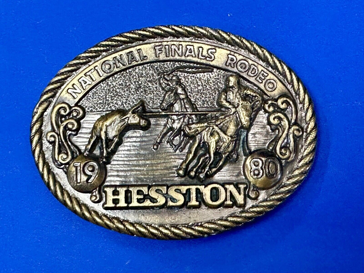 1980 NFR Rodeo Vintage Hesston Cow Roping Steer Wrestling Cowboy belt buckle