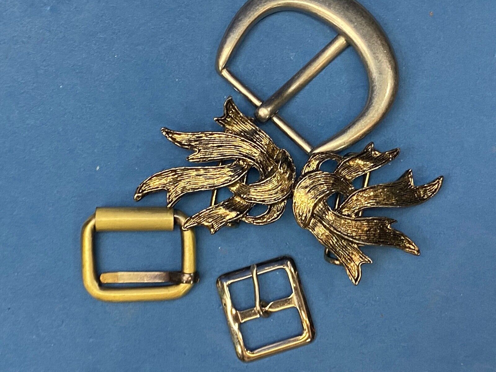 4 piece Mixed lot of belt buckle's  +_ 2 pc leaf buckle -resale, gifts, use etc!