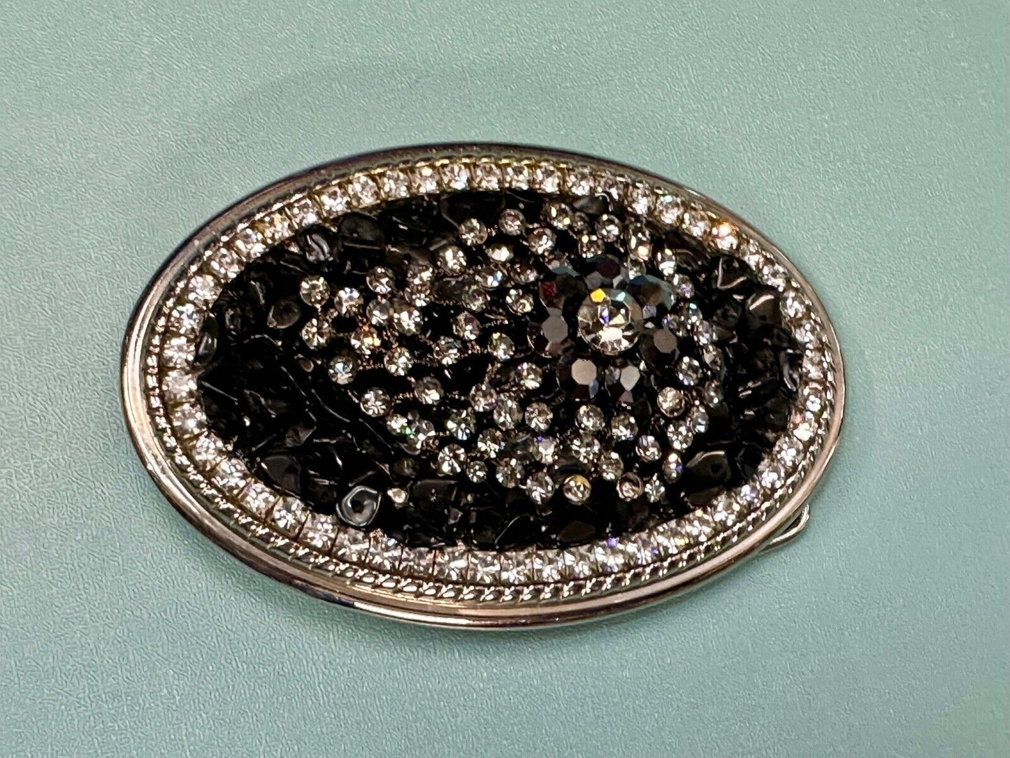 Artisan GHOST? Abstract animal head belt buckle covered in black rhinestone's