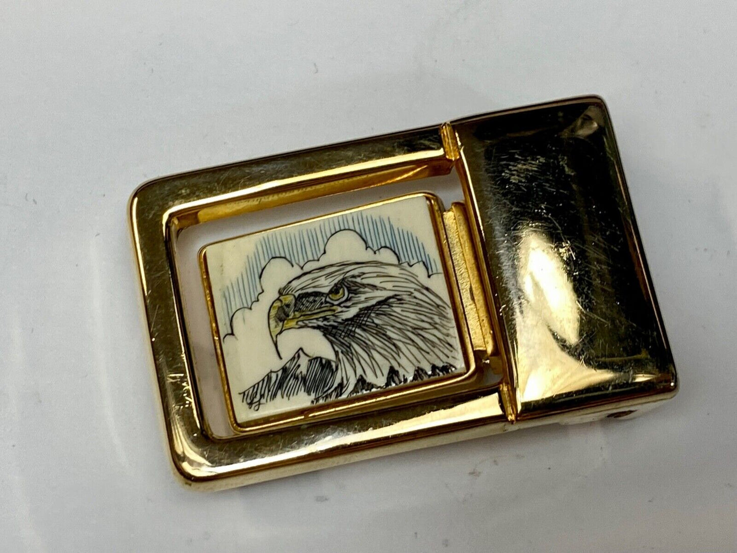 Patriotic American bald Eagle head on small brass or gold color belt buckle