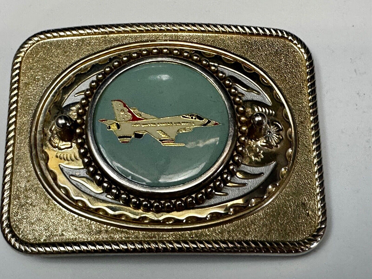 Us Air Force Fighter Jet as centerpiece in western Belt Buckle - or dollar coin