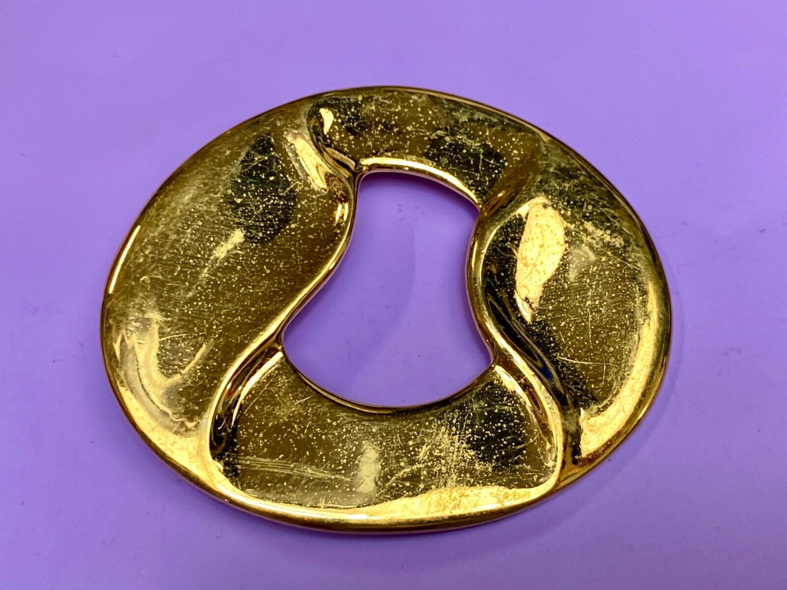 Artist Ginnie Johansen signed gold color abstract oval scarf slide