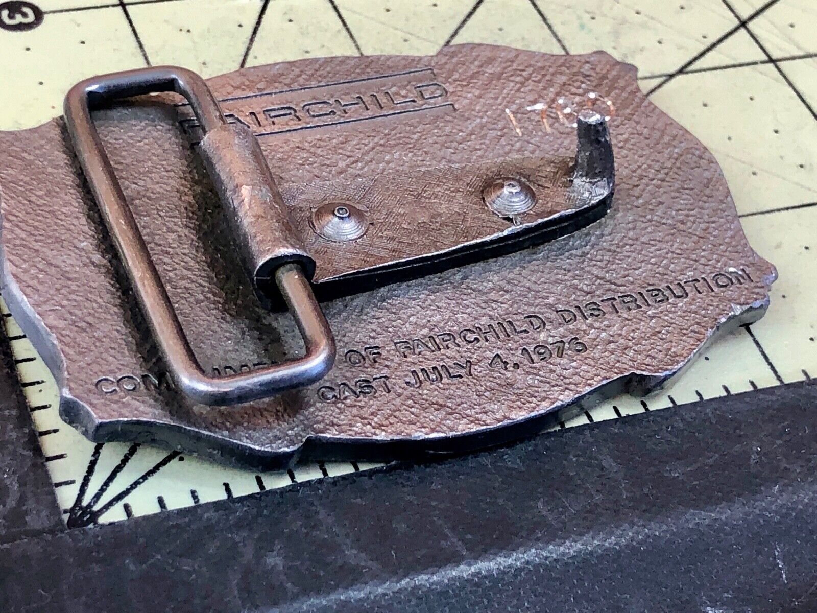 Vintage Fairchild Distribution company logo promotional belt buckle 
