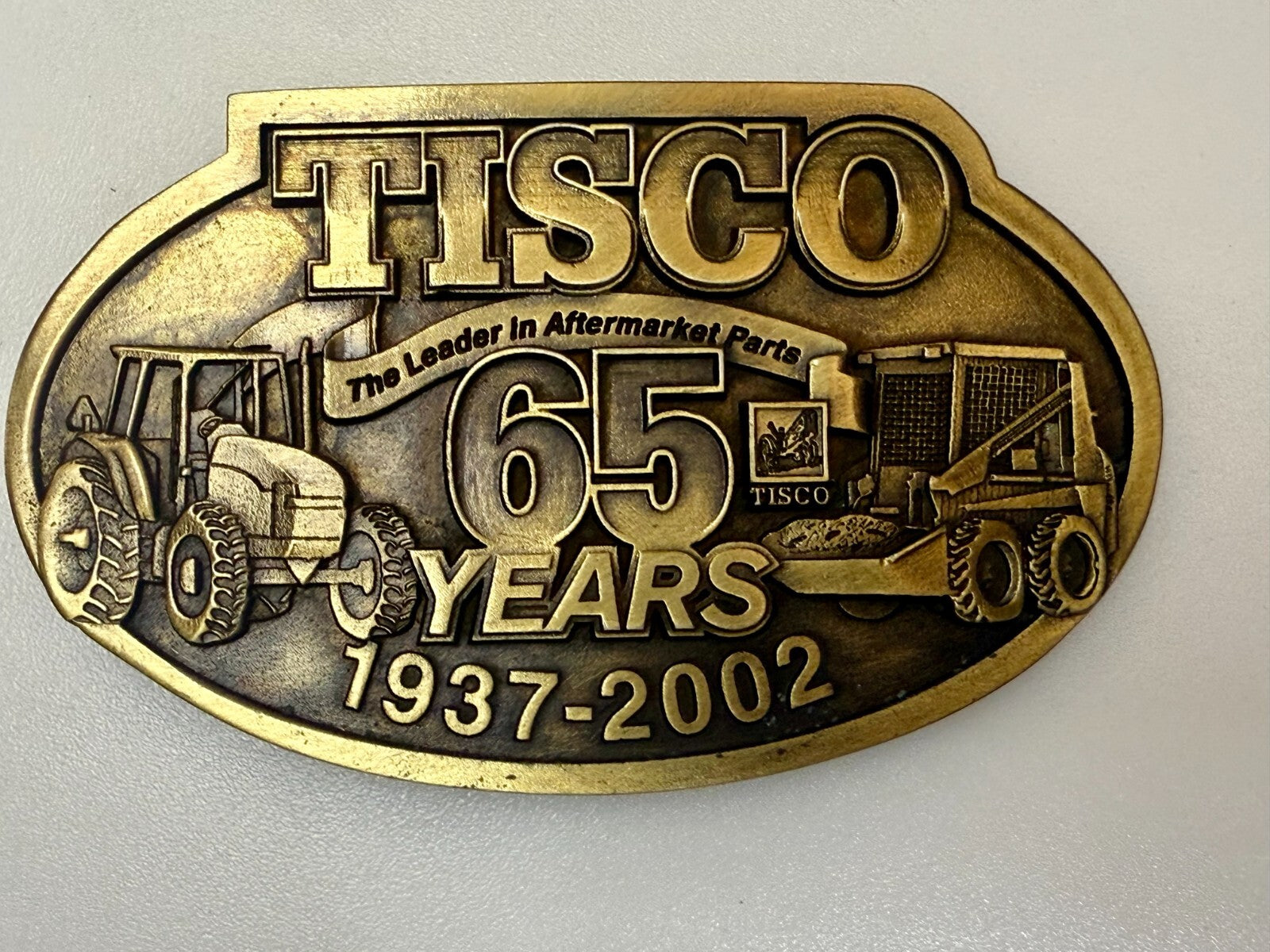 TISCO The Leader in Aftermarket Parts 65 Years 1937-2002 SPEC-CAST Belt Buckle