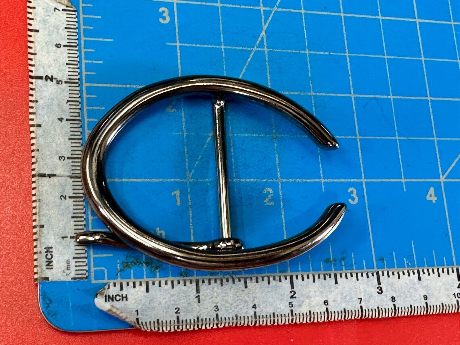 unique open oval black colored dress style belt buckle