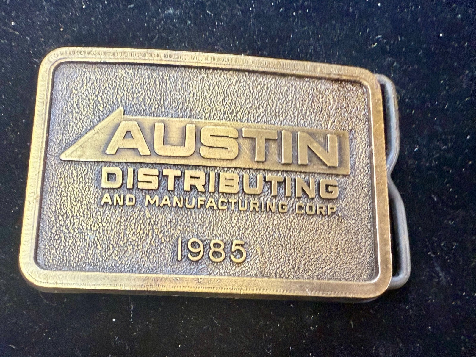 Austin Texas Distributing and Manufacturing Corp 1985 NOS RJ Belt Buckle