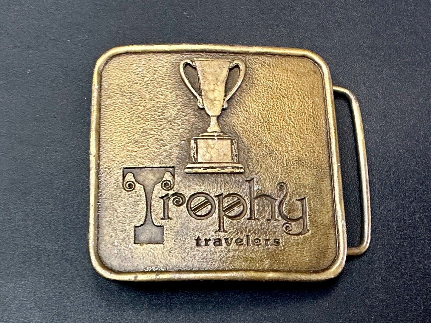 Trophy Travelers vintage Promo Company Advertising MPA 1975 belt buckle