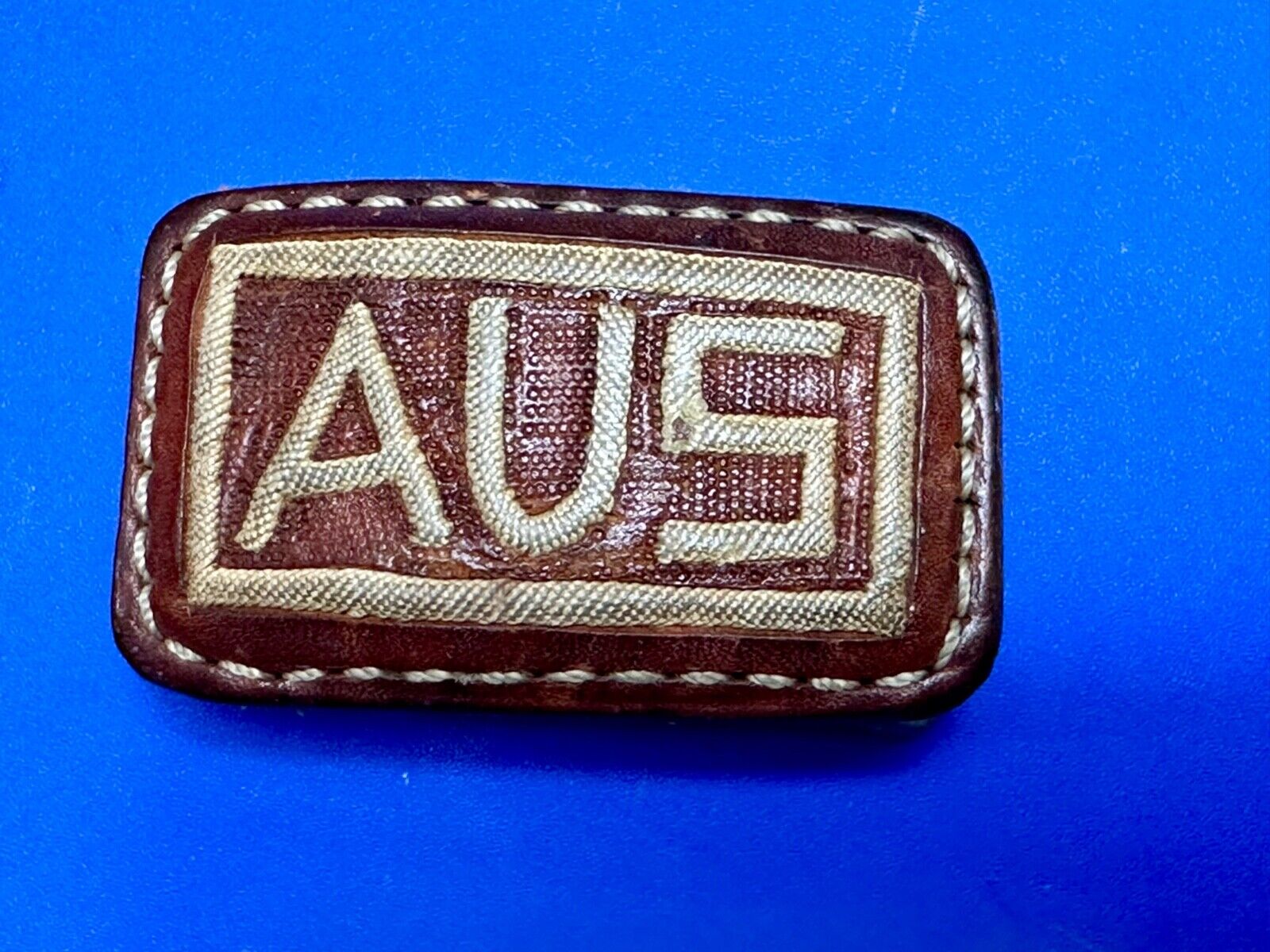 AUS  Brown leather with cream color Stitching  pre loved belt buckle