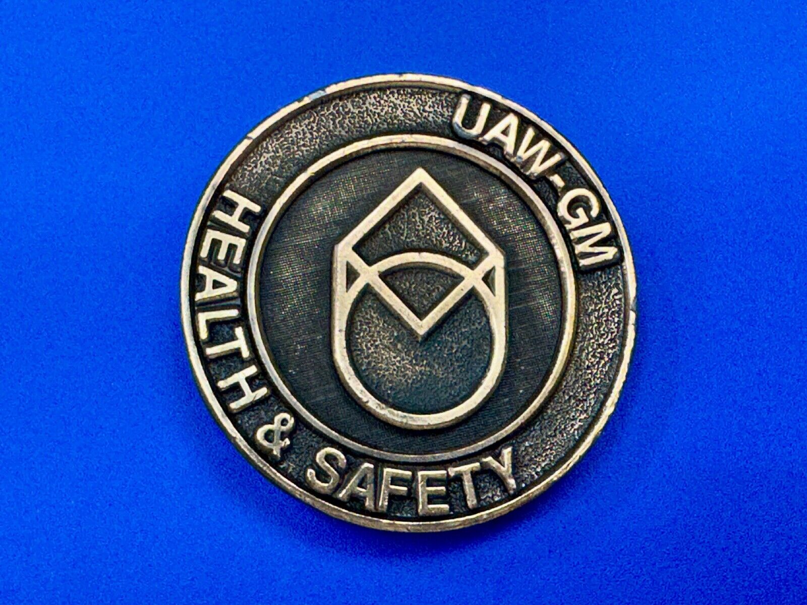 UAW-GM auto workers union round Health & Safety Award belt buckle