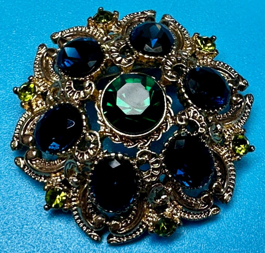Beautiful Round Flower Shaped Blue Green Rhinestone Brooch Pin Signed by SQUIRE