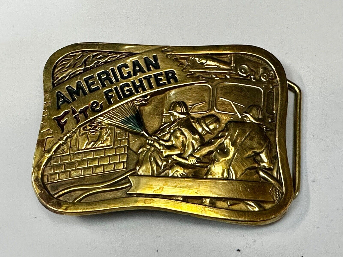 American Firefighters at work putting out fire Vintage 1981 Baron Belt Buckle
