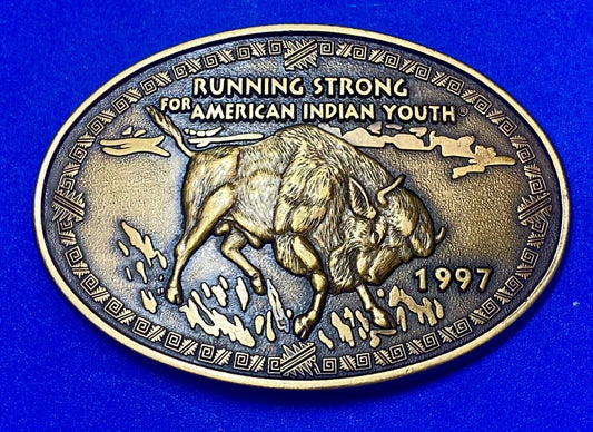 Vintage 1997 BUFFALO belt buckle RUNNING STRONG FOR AMERICAN INDIAN YOUTH