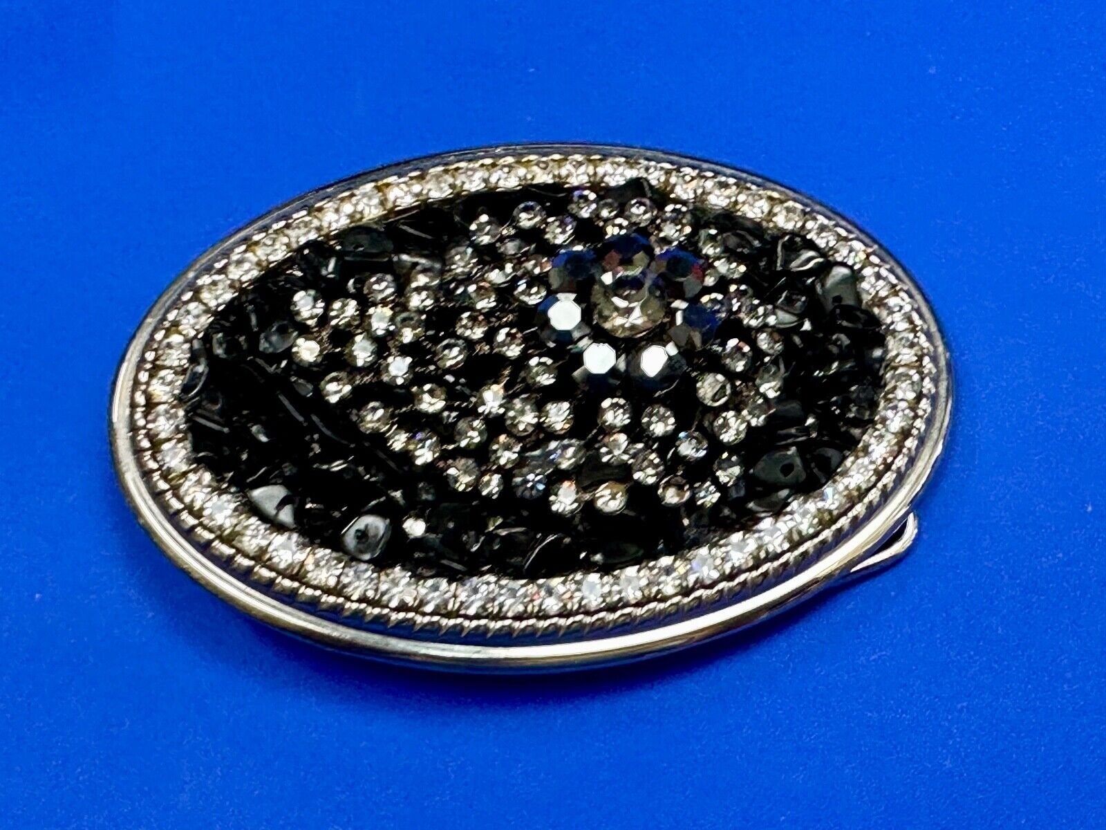 Artisan GHOST? Abstract animal head belt buckle covered in black rhinestone's