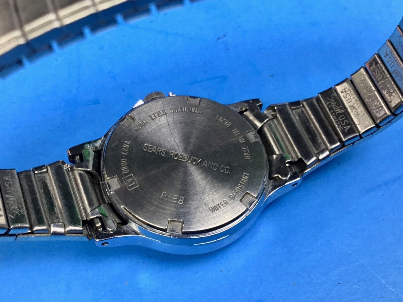 Vintage  Ladies Silver Tone Watch Phasar Quartz Date Stretch V227-0130 R 