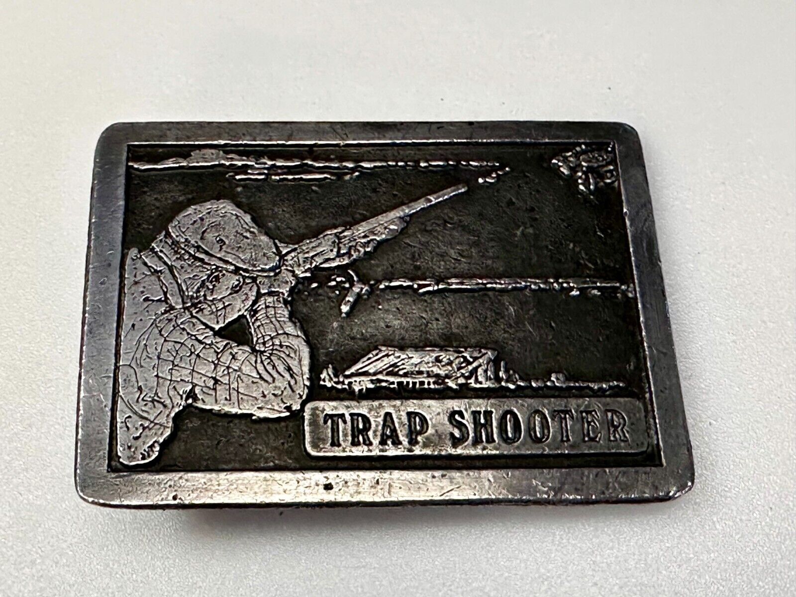 Trap Shooter Shooting Positions Gun Rifle Sports Vintage 1976 Belt Buckle by NS