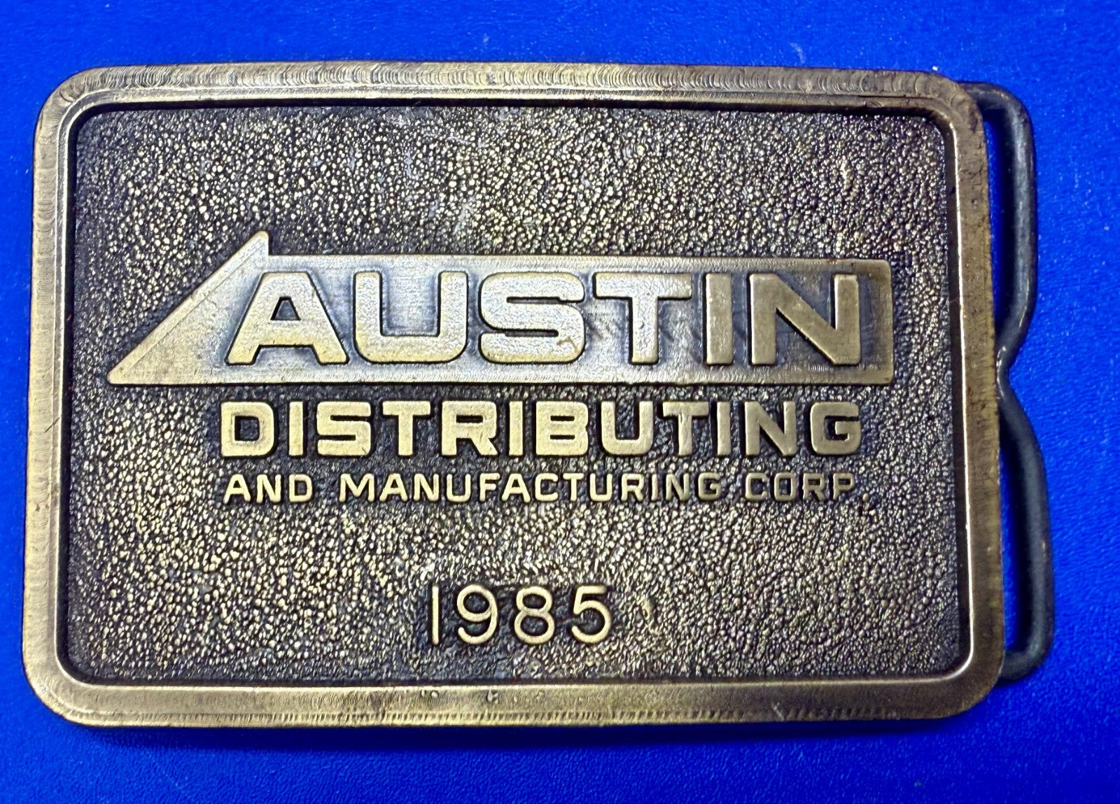 Austin Texas Distributing and Manufacturing Corp 1985 NOS RJ Belt Buckle