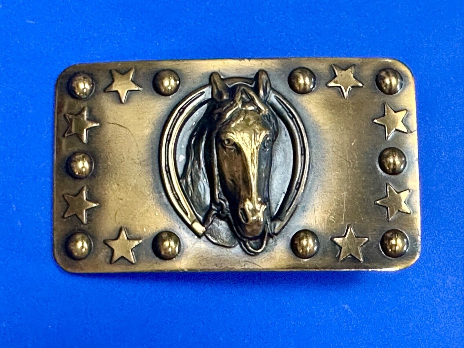 Vintage Horse head belt buckle with stars and circles boarder