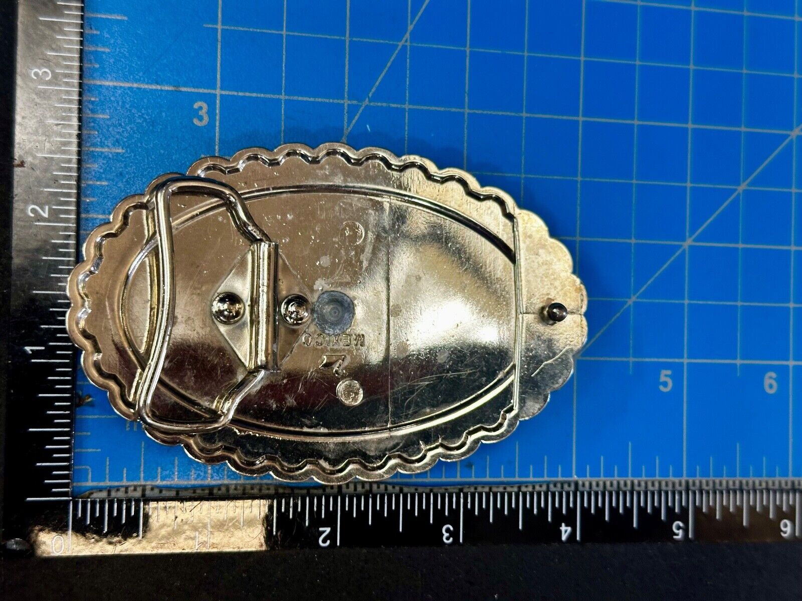 Two horse heads - Vintage two tone oval Belt Buckle with reflective backing