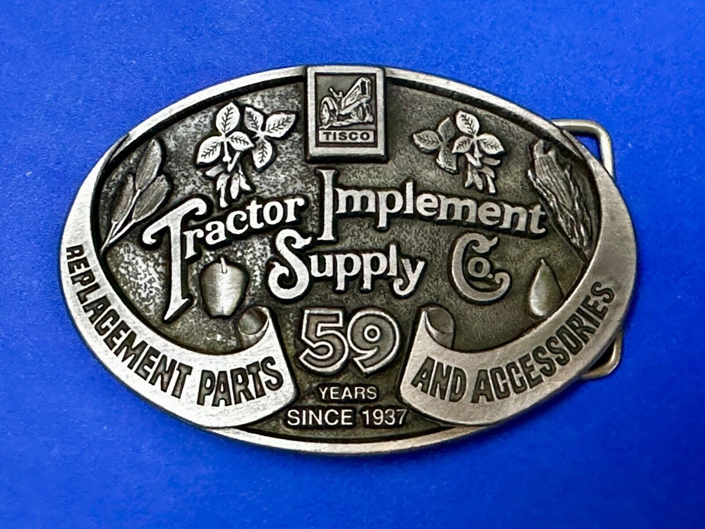 59 Years TISCO Tractor Implement Supply company Belt Buckle by Speccast