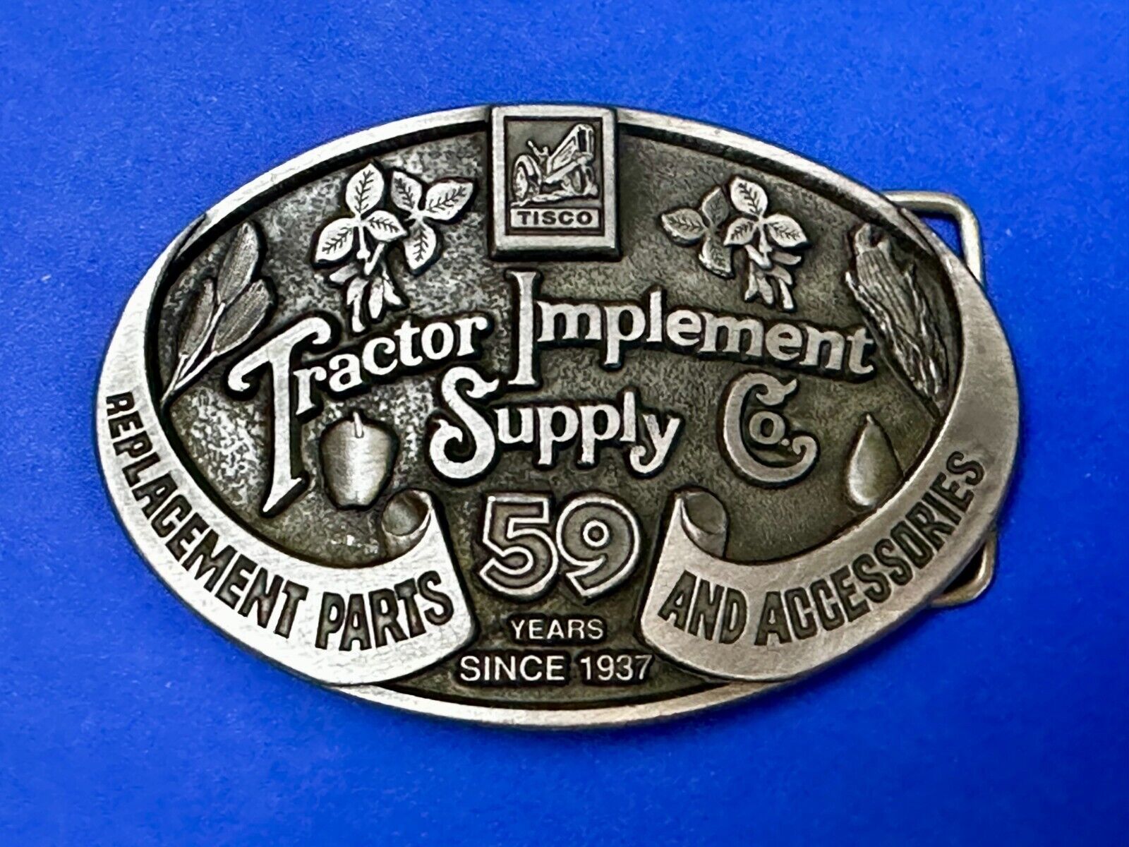 59 Years TISCO Tractor Implement Supply company Belt Buckle by Speccast