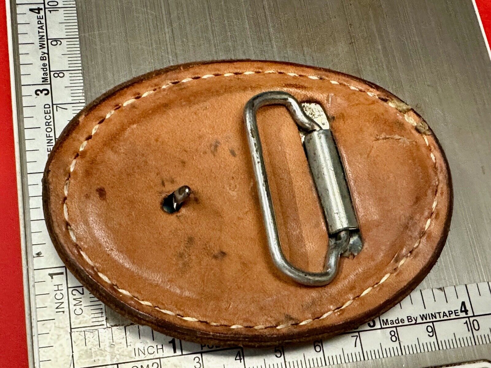 Unique leaf pattern in leather belt buckle made of Abalone shell