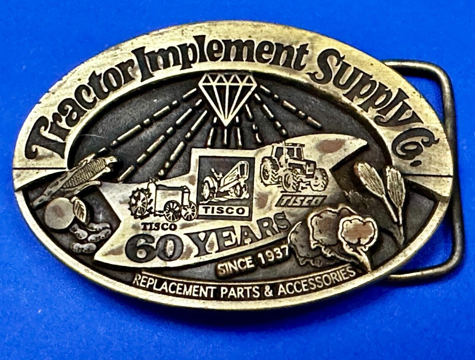 60 Years TISCO Tractor Implement Supply company NOS Belt Buckle by Speccast