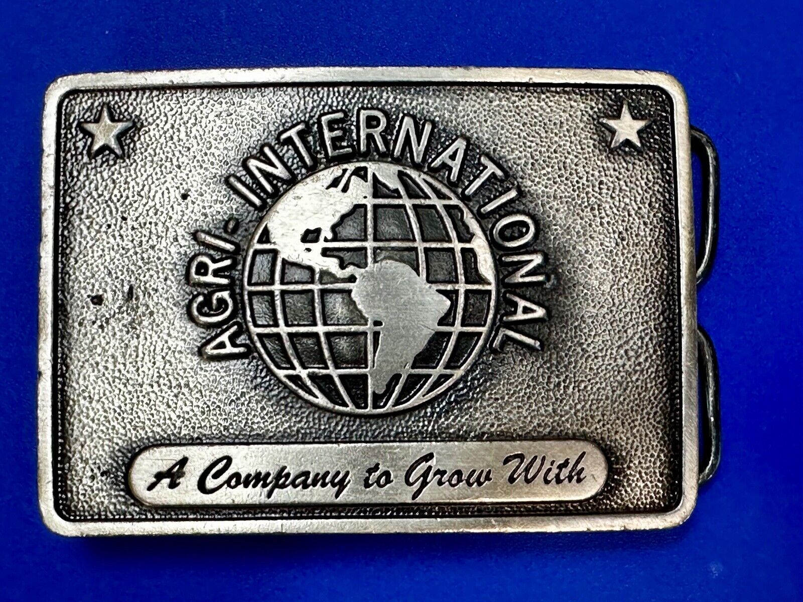 Agri International Inc Omaha NE A comma my to grow with Bergamot Belt Buckle