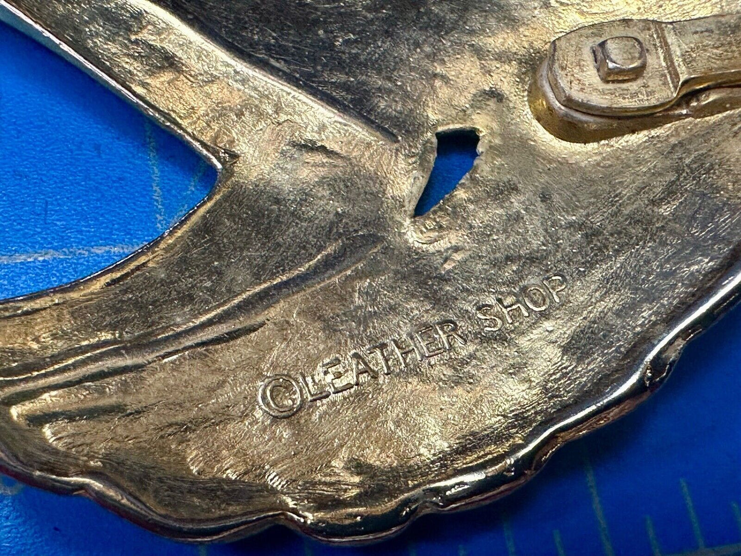 Abstract Art - Wings  gold tone belt buckle signed Leather shop
