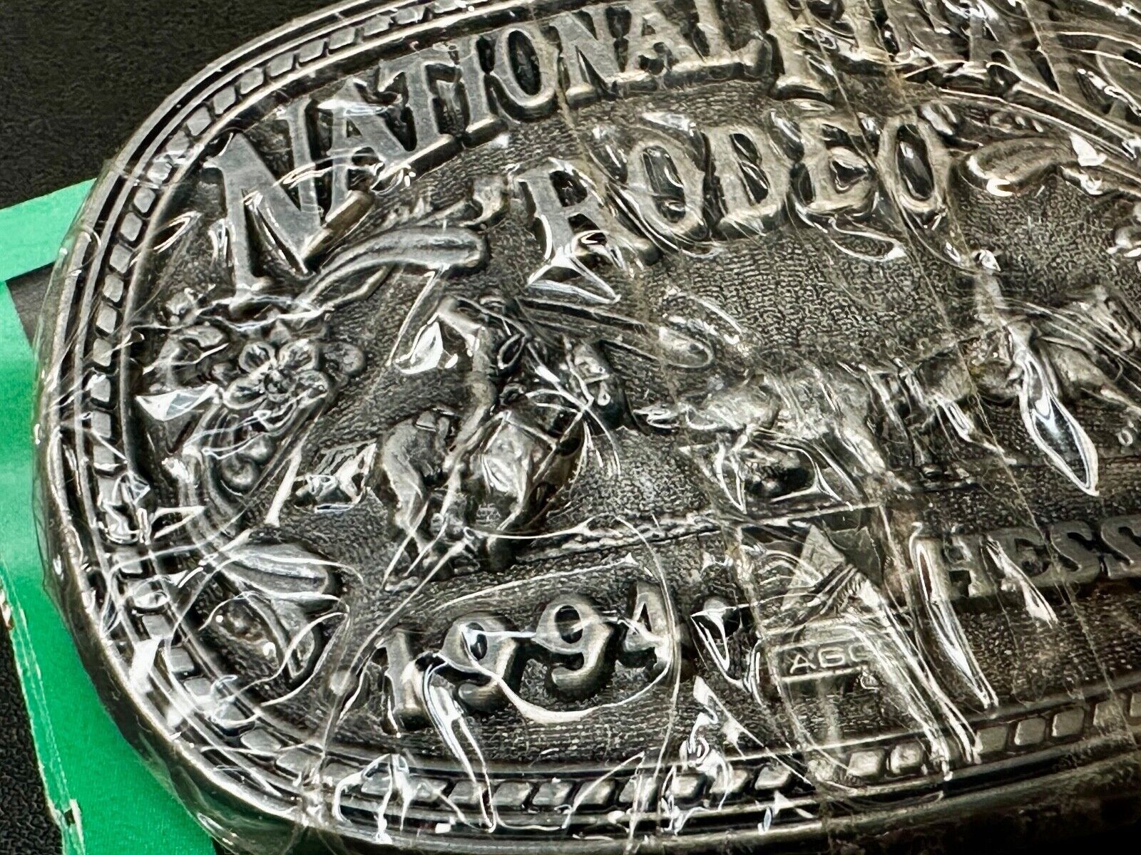 1994 ADM NATIONAL FINALS RODEO YOUTH SIZE  NFR NOS WESTERN COWBOY BELT BUCKLE