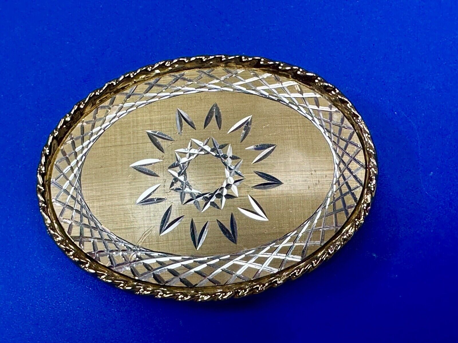 vintage gold tone starburst design oval belt buckle marked W