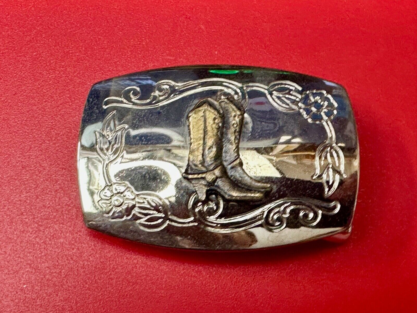 USA made Western Cowboy boots on reflective two tone vintage belt buckle