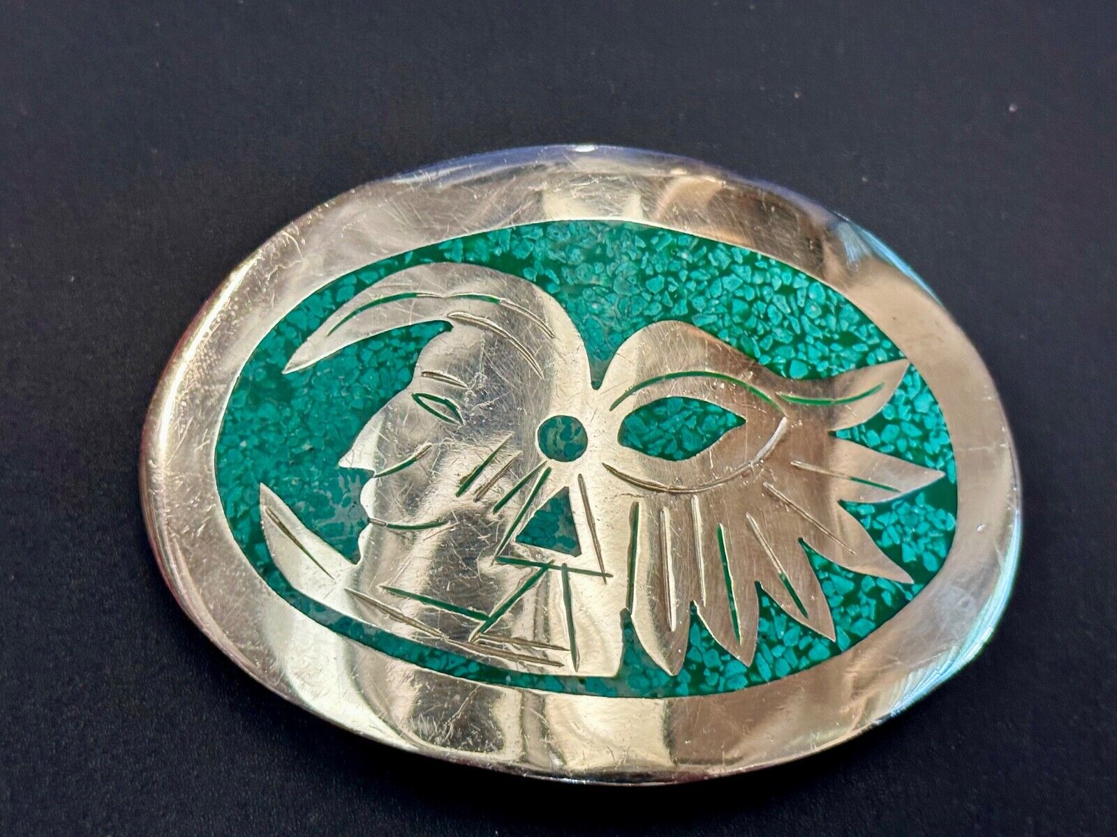 Tribal Face - Inlaid Turquoise chip to Alpaca stamped oval Belt Buckle