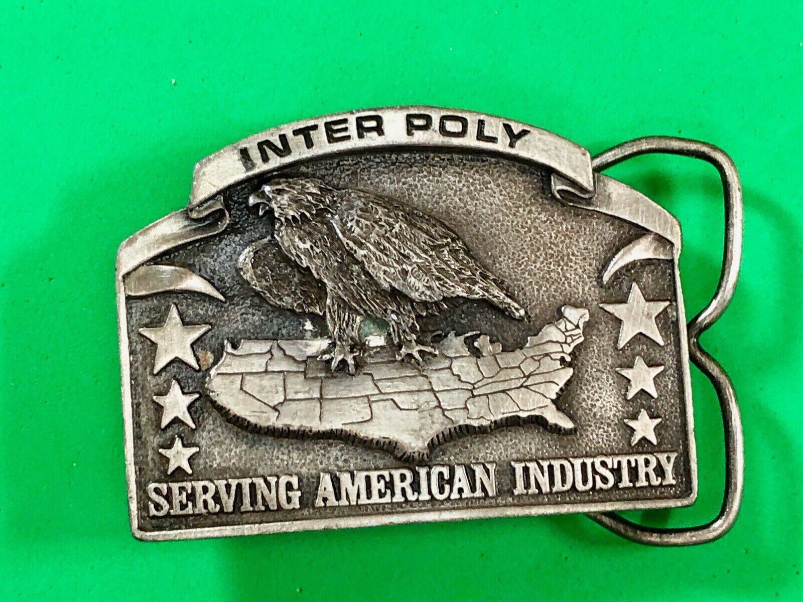 Vintage 1981 Bergamot Inter Poly Serving Americas Industry belt buckle 